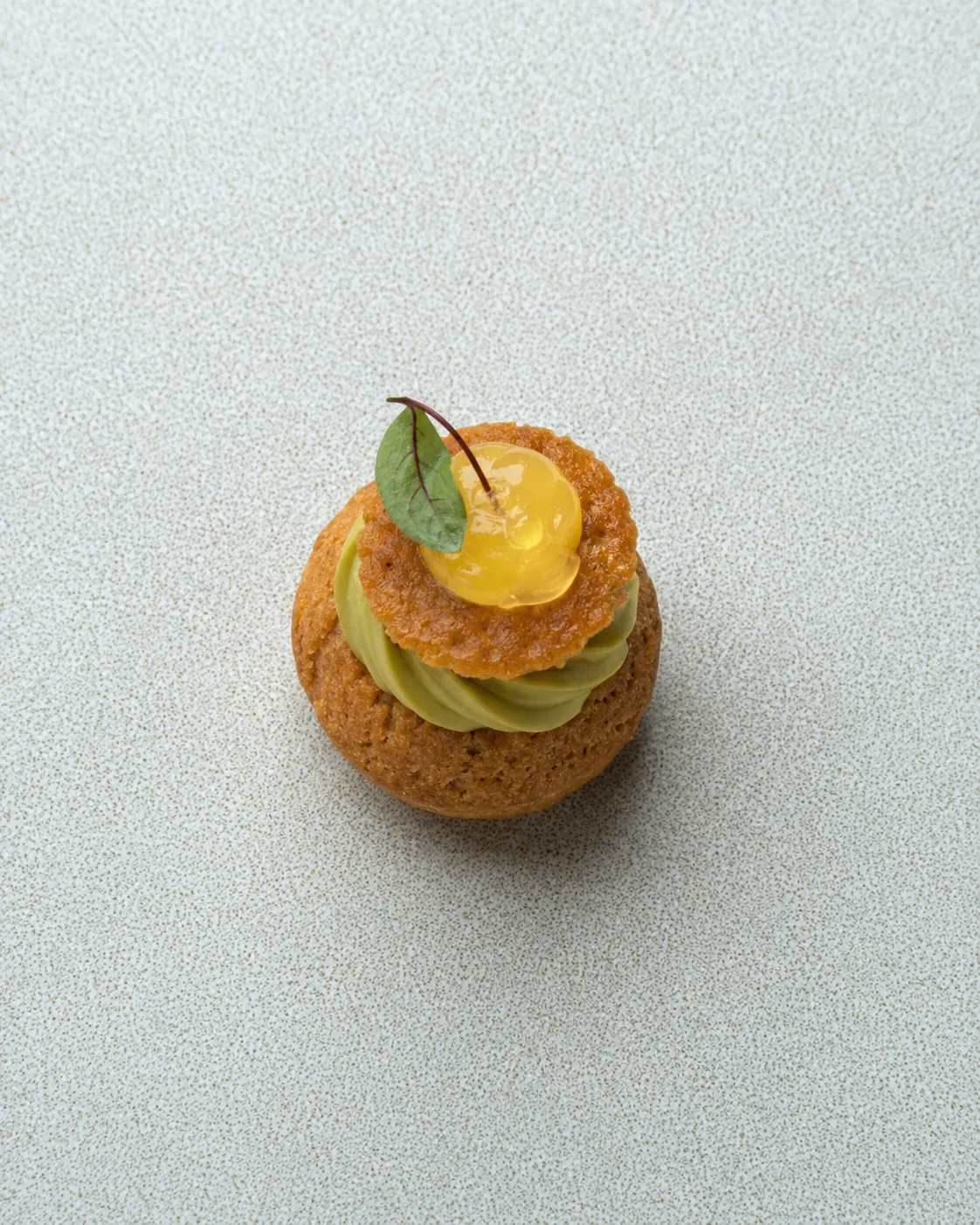 Chou pistache et agrumes en mignardise sucrée — Maison Yuzū traiteur
